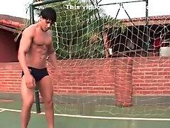 Muscle Boy Plays Soccer In Backyard